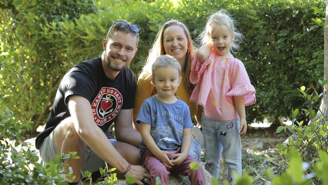 John and Kylie Kirkegaard with their twins James and Grace. James has had croup several times this year, but Grace has missed out, thankfully. Picture: Mark Cranitch.