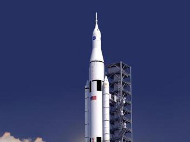 This artist concept provided by NASA shows the launch of the rocket design, called the Space Launch System. The design for NASA's newest behemoth of a rocket harkens back to the giant workhorse liquid rockets that propelled men to the moon. But this time the destinations will be much farther and the rocket even more powerful. (AP Photo/NASA)