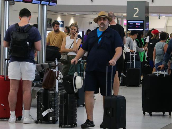 SYDNEY, AUSTRALIA - Newswire Photos DECEMBER 28, 2022: Travellers are experiencing longer than usual wait times to collect their baggage at the Domestic Airport in Sydney. Picture: NCA Newswire / Gaye Gerard