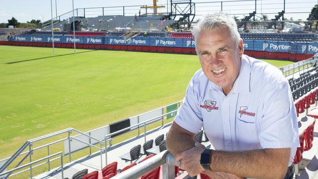 Redcliffe Dolphins CEO Tony Murphy poses for a photograph with the new Northern stand being constructed in the background. Picture: Renae Droop