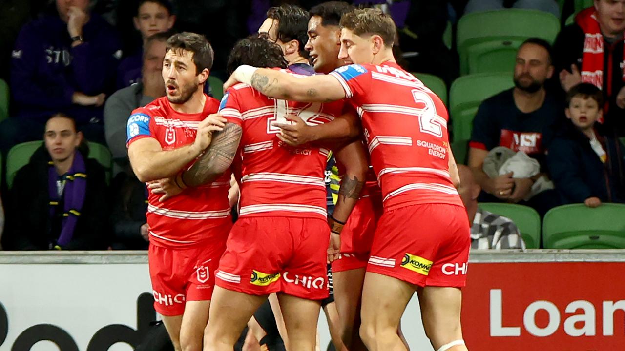 MELBOURNE, AUSTRALIA - AUGUST 03: The Dragons celebrate a tryduring the round 22 NRL match between Melbourne Storm and St George Illawarra Dragons at AAMI Park, on August 03, 2024, in Melbourne, Australia. (Photo by Josh Chadwick/Getty Images)