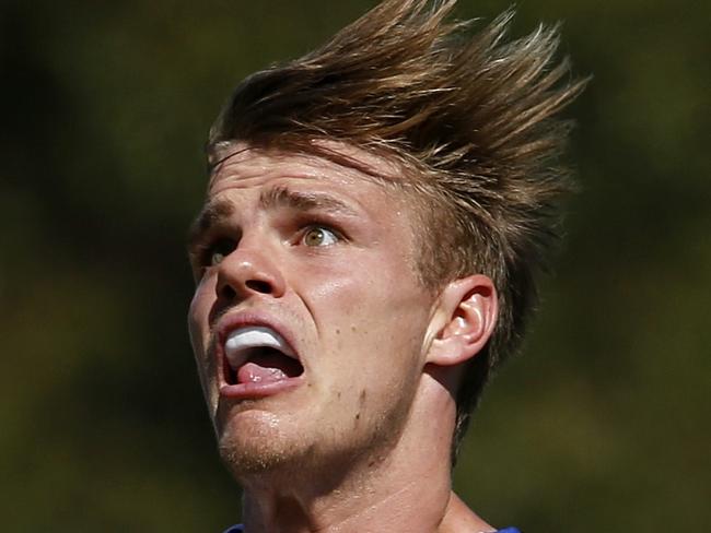 NAB Challenge. St Kilda v North Melbourne at Norm Winns Oval, Wangaratta. Mason Wood marks . Pic: Michael Klein