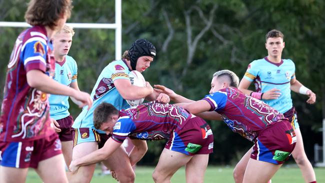 Wavell players drive into the tackle - Wavell have only claimed one win, but the effort is evident. - Photo Steve Pohlner