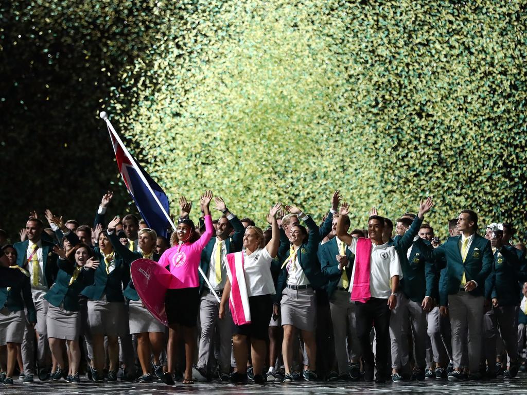 Mark Knowles, flag bearer of Australia arrives with the Australia team during the Opening Ceremony for the Gold Coast 2018 Commonwealth Games at Carrara Stadium on April 4, 2018 on the Gold Coast, Australia. (Photo by Ryan Pierse/Getty Images)