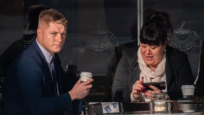 Kurt De Luis has coffee with a supporter before the trial resumed. Picture: Monique Harmer