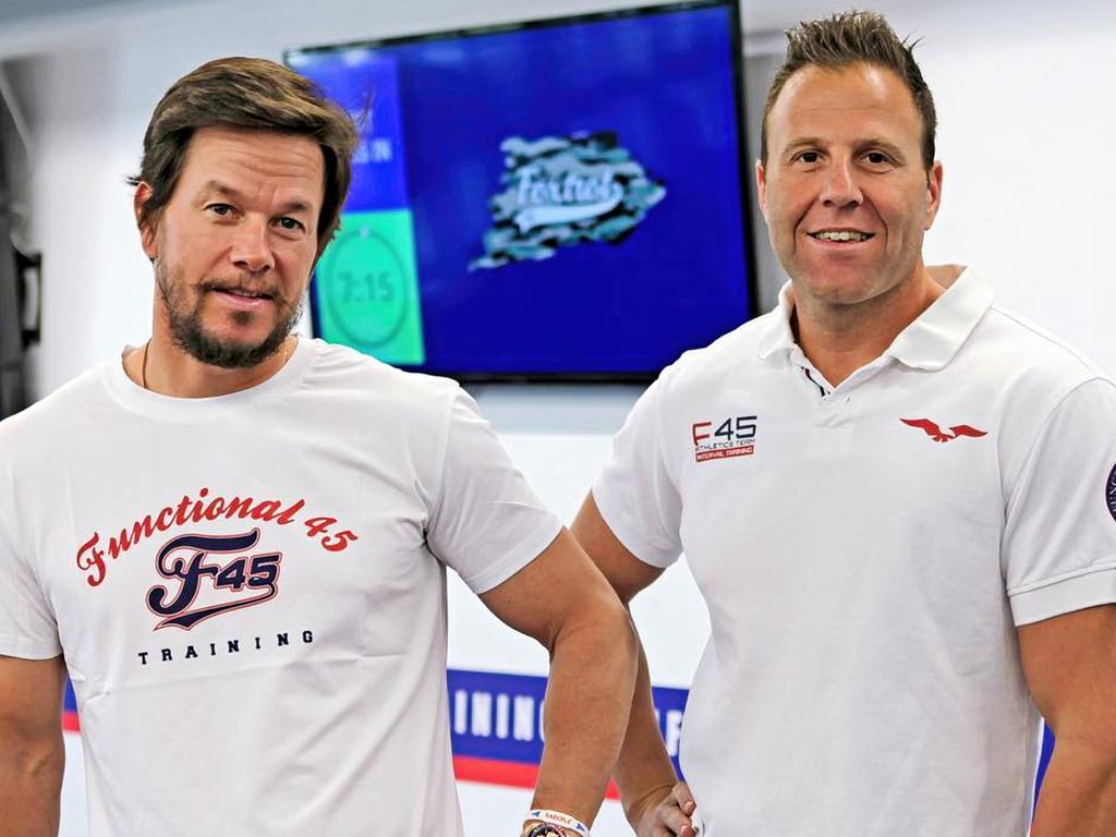 F45 owner Rob Deutsch, right, with actor Mark Wahlberg, who bought a minority stake in the company in 2019. Picture: Instagram / F45 Training