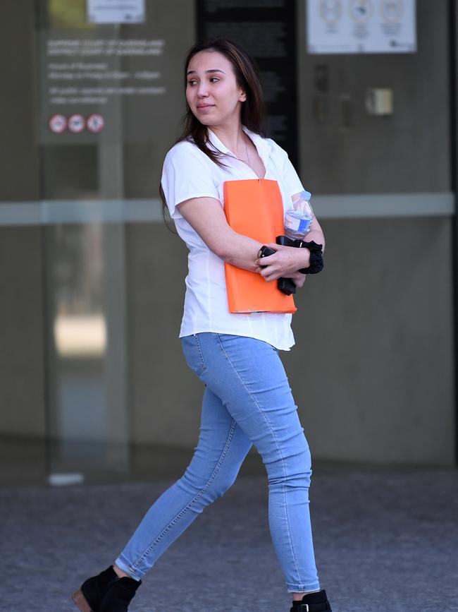 Melissa Aras leaves the District Court in Brisbane after pleading guilty to extortion. Picture: NCA NewsWire/Dan Peled