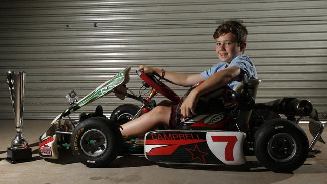 Go-Kart Champion Lachlan Campbell 11, from Annangrove wit his go-kart.