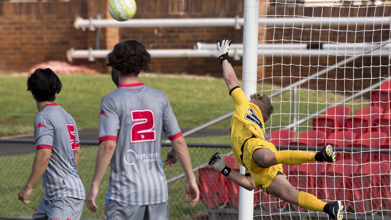 Holland Park keeper Luka Zoric can't stop Thunder's first goal.Football Qld NPL, SW Qld Thunder vs Holland Park Hawks FC. Sunday, 1st Mar, 2020.