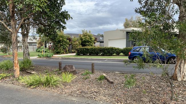 Street posts were knocked out and a tree left damaged after a ute crashed in Woodgrove Boulevard in Beerwah. Picture: Aisling Brennan