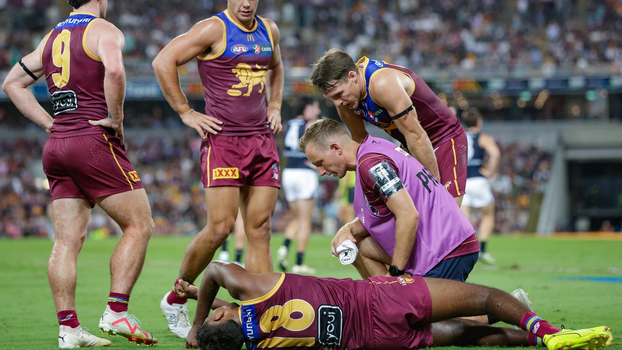 BRISBANE, AUSTRALIA - MARCH 08: Keidean Coleman of the Lions lays injured on the ground during the 2024 AFL Opening Round match between the Brisbane Lions and the Carlton Blues at The Gabba on March 08, 2024 in Brisbane, Australia. (Photo by Russell Freeman/AFL Photos via Getty Images)