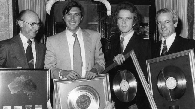 Ferry (2nd left) at the Adelaide presentation of four platinum and five gold album awards from his Australian record companies. Used "The News" 26 May 1977. (Pic: Unidentified staff photographer)