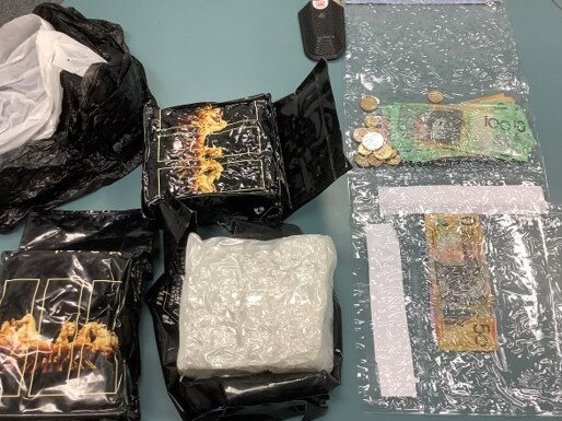 Mackay police seized three kilograms of methylamphetamines, two grams of cocaine and more than $9000 cash after stopping an alleged speeding vehicle at Sarina. Picture: QPS