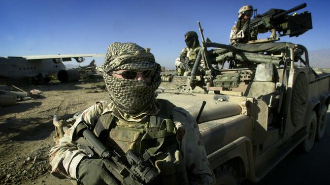 Australian Special Air Services (SAS) soldiers with a long range patrol vehicle at Bagram Airbase in Afghanistan in September 2002. Picture: File