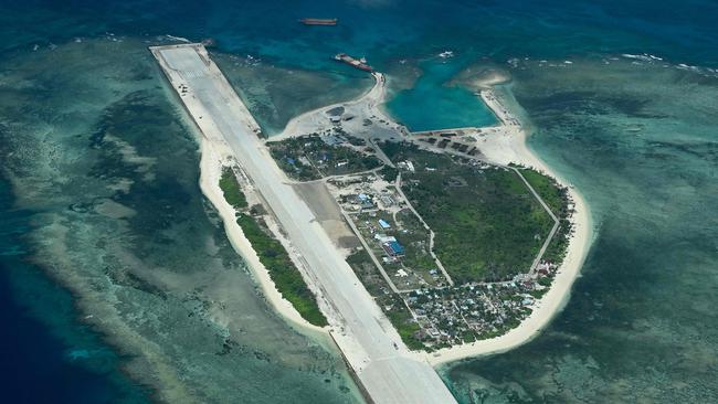 An aerial view taken on March 9, 2023 shows Thitu Island in the South China Sea. As a Philippine Coast Guard plane carrying journalists flew over the Spratly Islands in the hotly disputed South China Sea, a Chinese voice issued a stern command over the radio: 