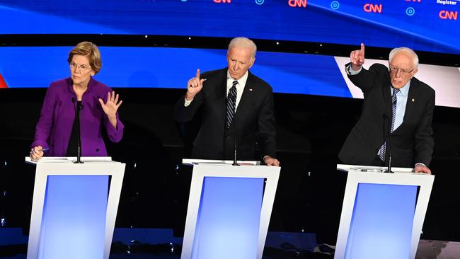 Presidential hopefuls Elizabeth Warren, Joe Biden and Bernie Sanders participate in a Democratic primary debate in Des Moines, Iowa. Picture: AFP