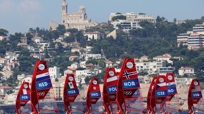 Windsurfers compete in Race 2 of the womenâs IQFoil windsurfing event after an interruption during the Paris 2024 Olympic Games sailing competition at the Roucas-Blanc Marina in Marseille on July 29, 2024. (Photo by Clement MAHOUDEAU / AFP)