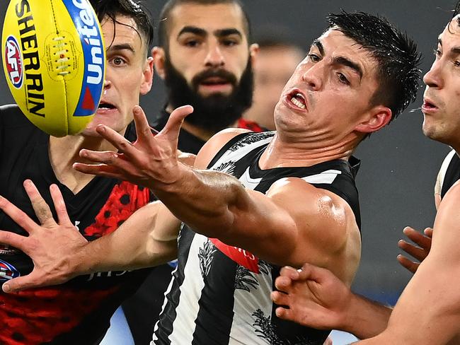 MELBOURNE, AUSTRALIA - JULY 03: Brayden Maynard of the Magpies and Andrew McGrath of the Bombers compete for the ball during the round 5 AFL match between the Collingwood Magpies and he Essendon Bombers at Melbourne Cricket Ground on July 03, 2020 in Melbourne, Australia. (Photo by Quinn Rooney/Getty Images)