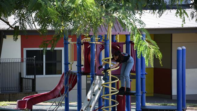 Cleaning Staff at Helensvale State School on Saturday. Picture: Steve Holland.