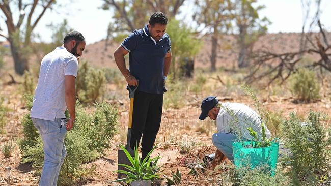 The grieving family of murder victim Jasmeen Kaur at the site where her body was discovered buried in a shallow grave in the Flinders Ranges near Hawker. Picture: Tom Huntley