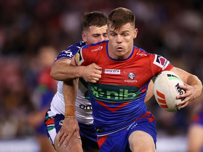 NEWCASTLE, AUSTRALIA - APRIL 09: Jayden Brailey of the Knights is tackled during the round six NRL match between Newcastle Knights and New Zealand Warriors at McDonald Jones Stadium on April 09, 2023 in Newcastle, Australia. (Photo by Cameron Spencer/Getty Images)