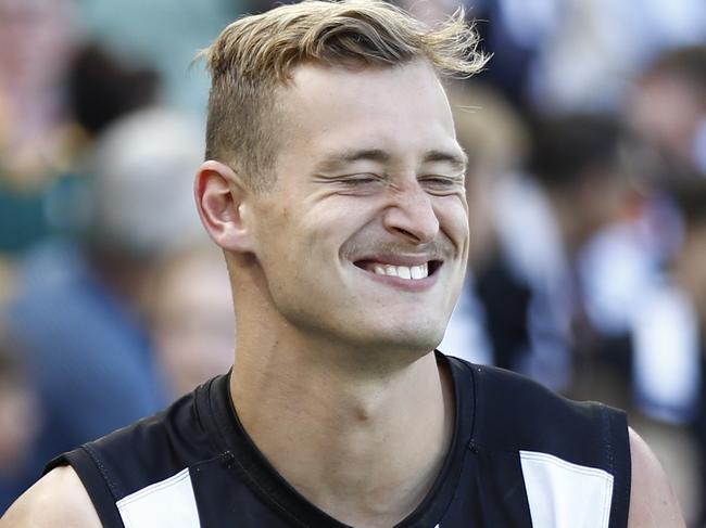 MELBOURNE, AUSTRALIA - MARCH 26: Nathan Kreuger of the Magpies ices his shoulder after the round two AFL match between the Collingwood Magpies and the Adelaide Crows at Melbourne Cricket Ground on March 26, 2022 in Melbourne, Australia. (Photo by Darrian Traynor/Getty Images)