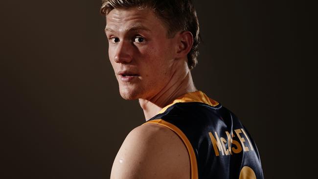 Fischer McAsey of the Adelaide Crows poses for a photograph during the first round of the 2019 AFL Draft at Marvel Stadium. Picture: Scott Barbour/AAP