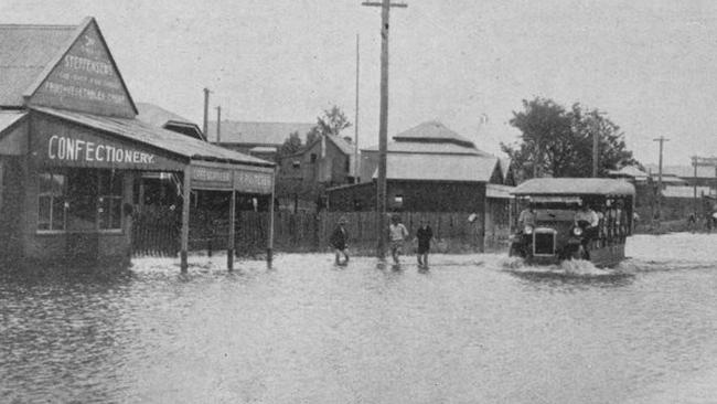 Bus travelling through a flooded street, Bundaberg, 1928. A sobering example of the region’s periodic flooding challenges. Source: State Library of Queensland