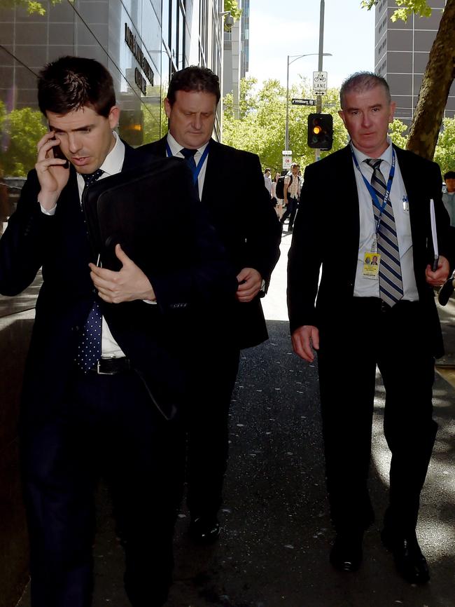 Detectives leave the Magistrates’ Court following Borce Ristevski’s appearance. Picture: AAP