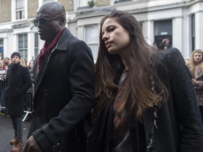 He’s the Voice ... British singer Seal (L) arrives to record the Band Aid 30 single. Picture: AFP PHOTO/ANDREW COWIE