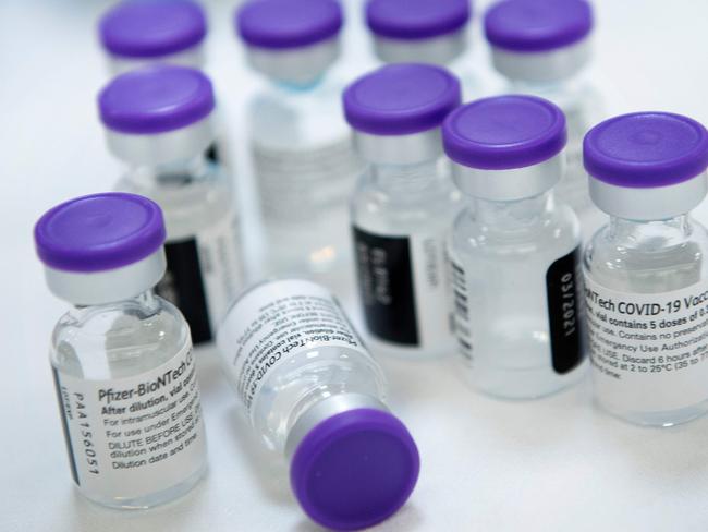 Vials of Pfizer COVID-19 vaccine are prepared to administer to people in Virginia. Picture: AFP