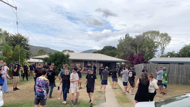 Police stand guard at a Norman Gardens home after a group rallied out front. Picture: Vanessa Jarrett