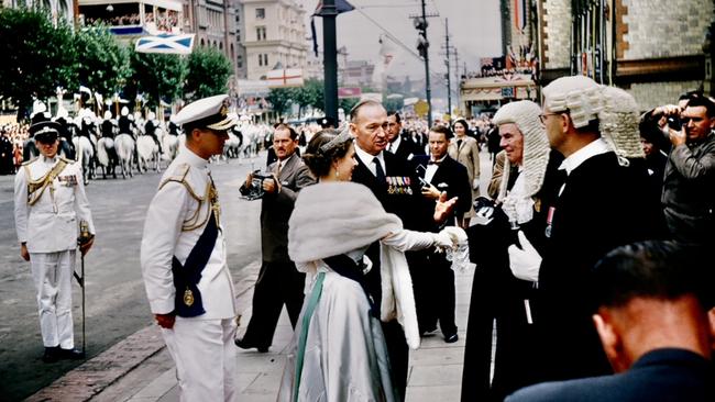 SA Premier Tom Playford introduces Queen Elizabeth II and Prince Philip to members of the judiciary outside Parliament House on North Terrace in March 1954. Picture: The Advertiser photographer Duncan Holmes