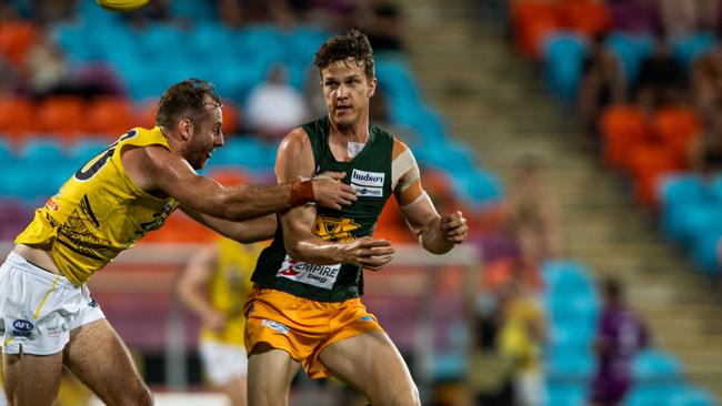 Kieren Parnell handballs for St Mary's against the Nightcliff Tigers in Round 1 of the 2024-25 NTFL season. Picture: Pema Tamang Pakhrin