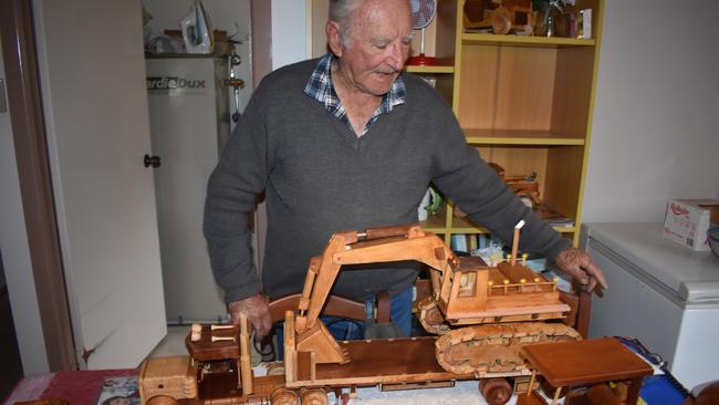 Neil Stuart makes rocking horses and wooden cars at his home in Evans Head