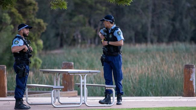 Police investigate after a man was stabbed while jogging at Lake Woodcroft on December 2. Picture: Dean Asher