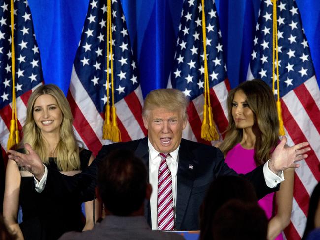 What will his family make of this? Donald Trump on stage with his wife Melania, right, and daughter Ivanka. Picture: Mary Altaffer.