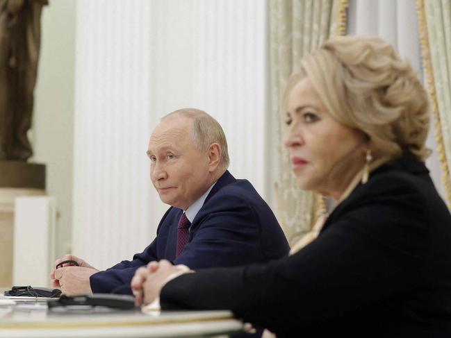 Russia's President Vladimir Putin and Federation Council Speaker Valentina Matviyenko attend a meeting with Turkey's Parliament Speaker at the Kremlin in Moscow, on September 25, 2024. (Photo by Maxim Shemetov / POOL / AFP)