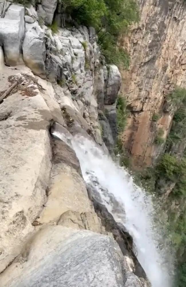 After the hiker’s video went viral, park officials sheepishly fessed up to making the “small modification” to the falls to ensure tourists see it in all its glory. Picture: Douyin