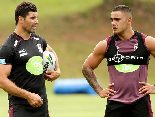 NO INTERNET BEFORE MIDNIGHT -Dylan Walker with coach Trent Barrett  at The Novatel Pacific Bay resort ,Coffs Harbour after signing a contract to play for the Manly Warringah Sea Eagles in 2016 , .Picture Gregg Porteous