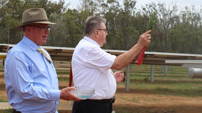 Bishop Michael McCarthy with Shalom College principal Dan McMahon blessing the school's solar farm.