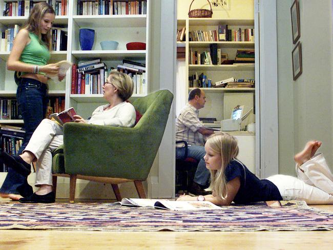APRIL 25, 2001 : Jane Caro & Ralph Dunning with daughters Polly (13) & Charlotte (10) at their North Shore home, despite being high income earners are opting to send girls to public schools. Pic Andrew Baker.