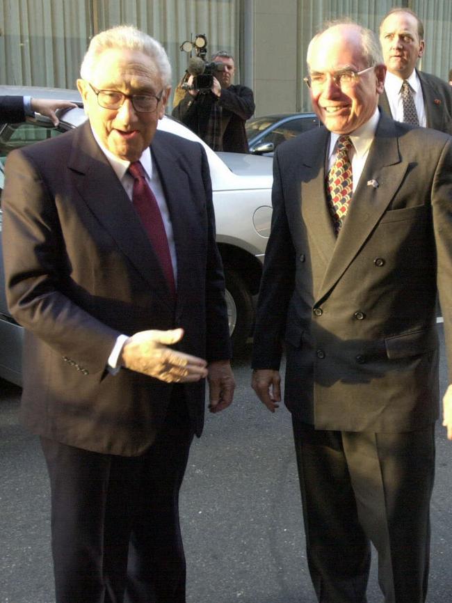 Kissinger, with John Howard in 2002. Picture: Ray Strange.