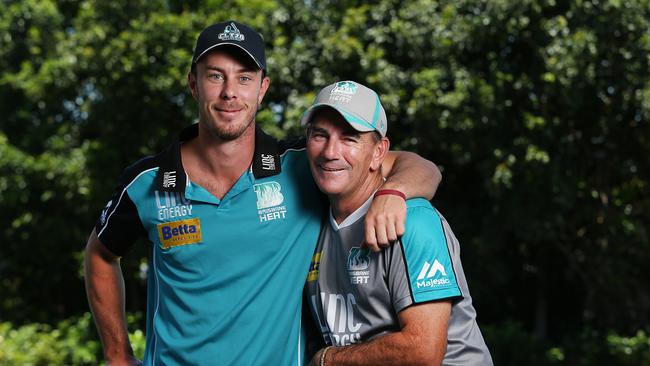 Gavin Fitness pictured with Chris Lynn. Fitness has been Lynn’s personal coach and is a former Bulls gloveman. Pictures: Jack Tran