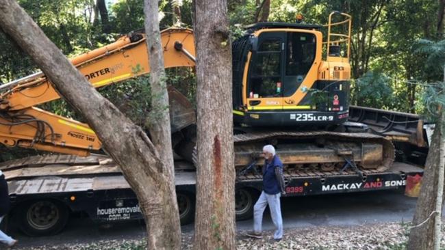 Machinery arrives at residents stage a blockade at Numinbah Forest Park in the Gold Coast hinterland.