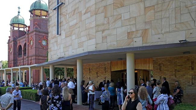 Mourners outside the chapel in Strathfield. Picture: Toby Zerna