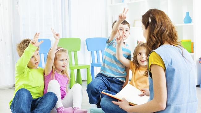 Generic photo of a childcare worker and children in a daycare centre