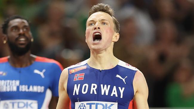 BUDAPEST, HUNGARY - AUGUST 23: Karsten Warholm of Team Norway celebrates winning the Men's 400m Hurdles Final during day five of the World Athletics Championships Budapest 2023 at National Athletics Centre on August 23, 2023 in Budapest, Hungary. (Photo by Christian Petersen/Getty Images for World Athletics)
