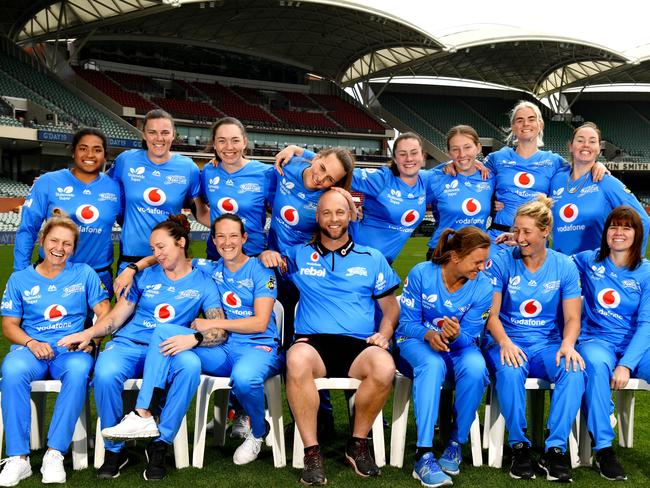 Katie Mack — back row, second from right — is enjoying life in Adelaide with her new Adelaide Strikers teammates: (Back L-R) Tabatha Saville, Tahlia McGrath, Annie O'Neil, Alex Price, Ellie Falconer, Darcie Brown, (Mack), Amanda-Jade Wellington. (Front L-R) Bridget Patterson, Sarah Coyte, Megan Schutt, Luke Williams (coach), Suzie Bates (captain), Sophie Devine, Tegan McPharlin Picture: TRICIA WATKINSON