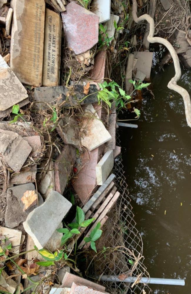 The scene of the lost headstones following the 2022 Brisbane floods. Picture: Christopher Dawson/Time Travel Club